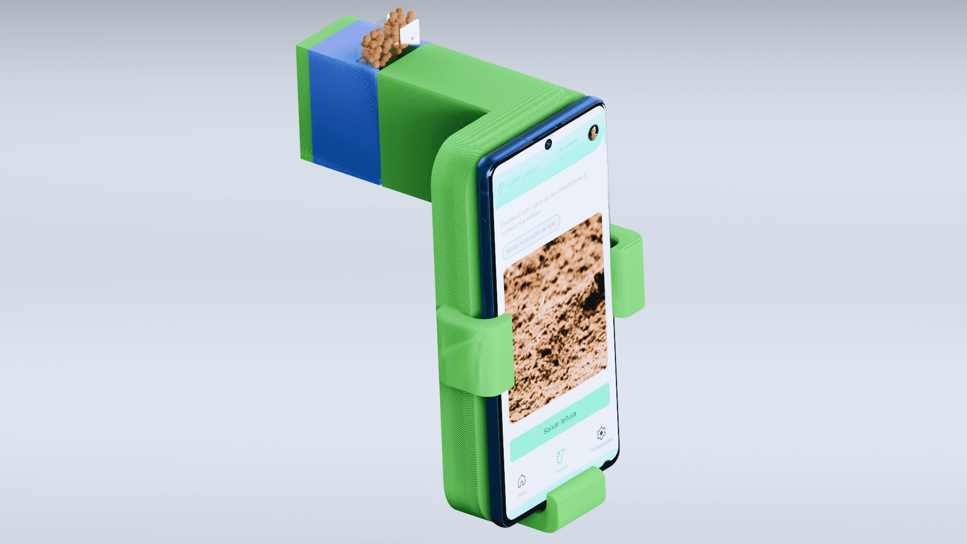 Labor Soil encaixado em um smartphone, com a câmara de amostra de solo no topo e o app Lumi Labor no modo analisador de solo